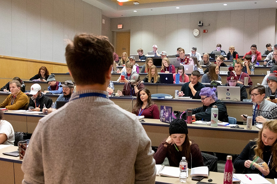 Students attending a class in a lecture hall