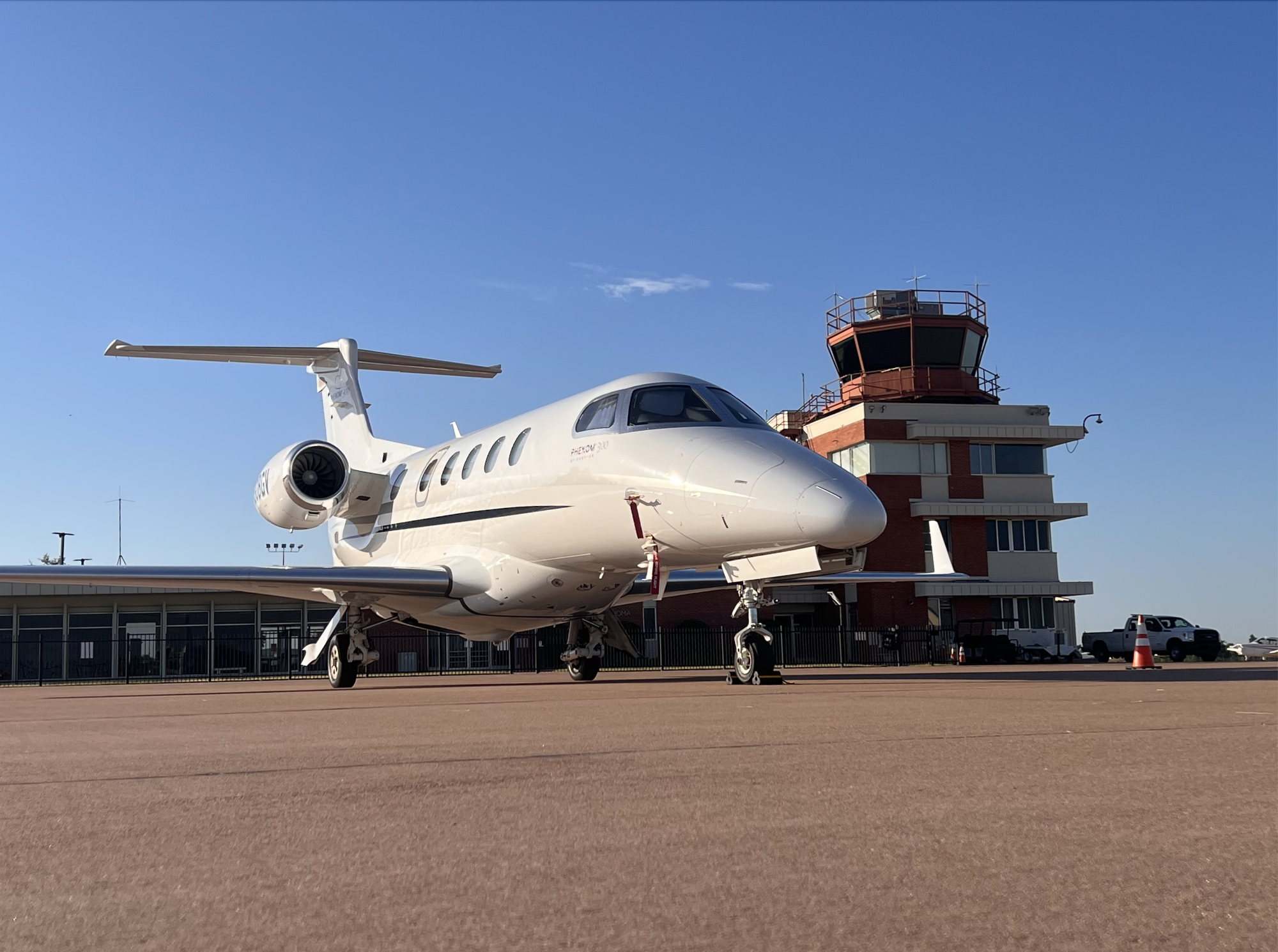 Aircraft on the ramp in front of the Max Westheimer Airport terminal building.