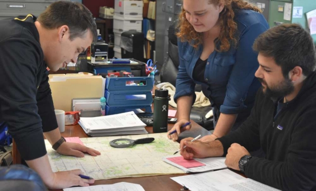 Archaeological Consultants Header Image, CAP students assisting in site file search