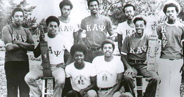 A black and white photograph of a group of fraternity members.