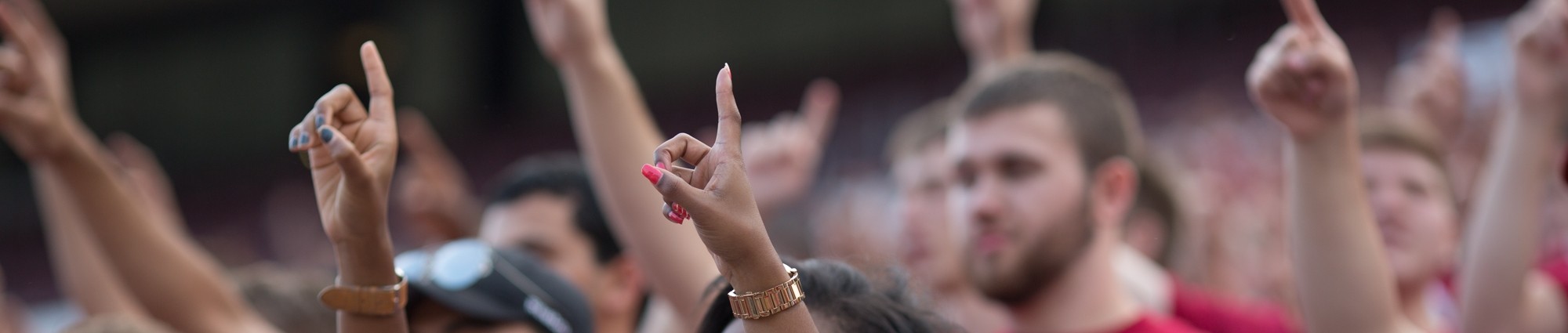 Sooner football fans cheering on the OU football team.