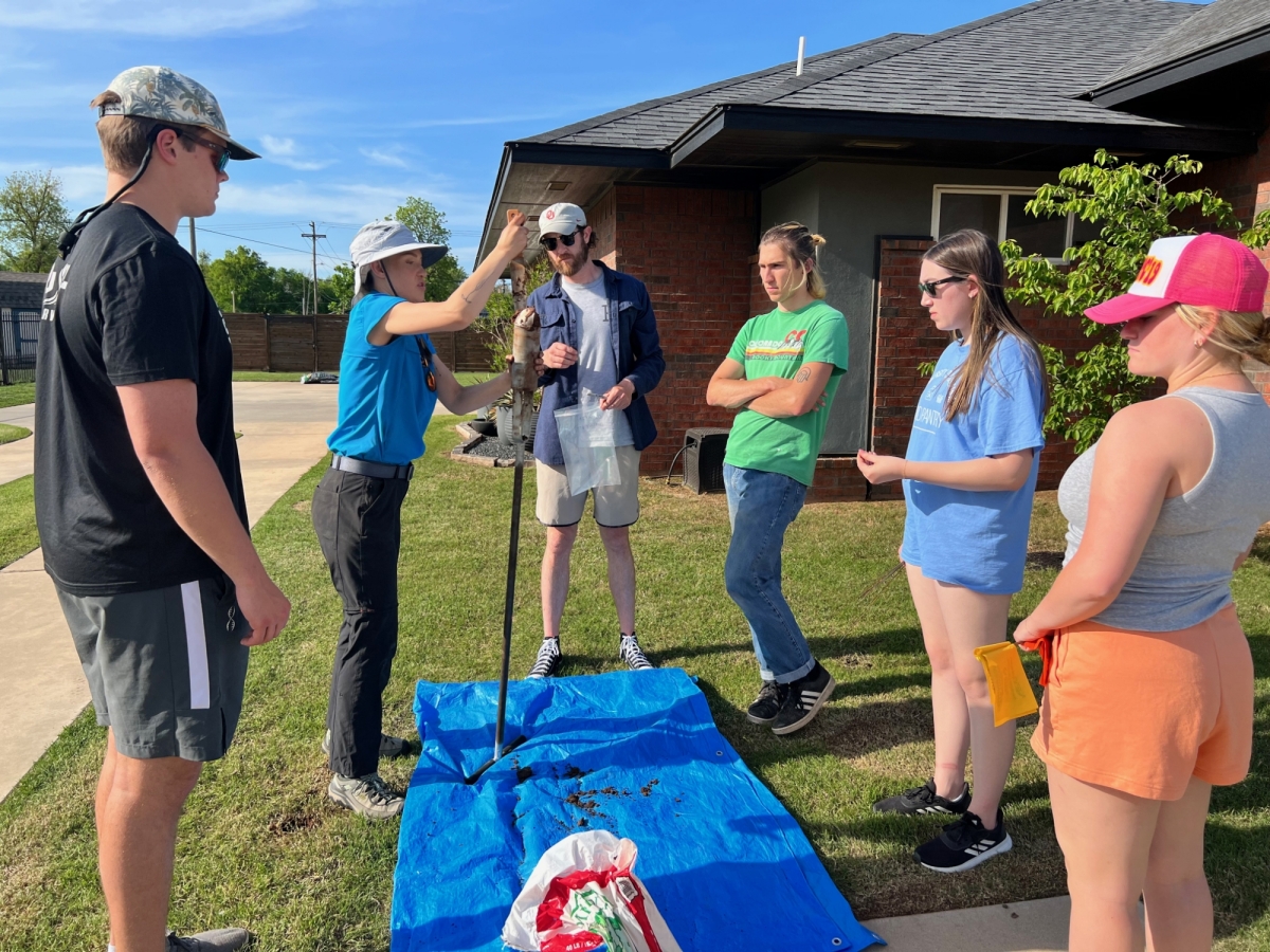 Students taking soil samples