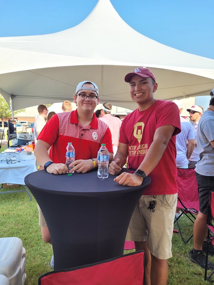 Two young men at an event.