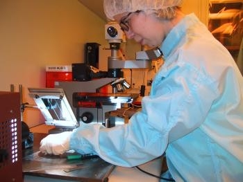 Student performs photolithography in our clean room.