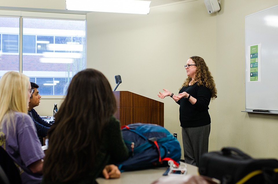 Political science faculty member teaching.