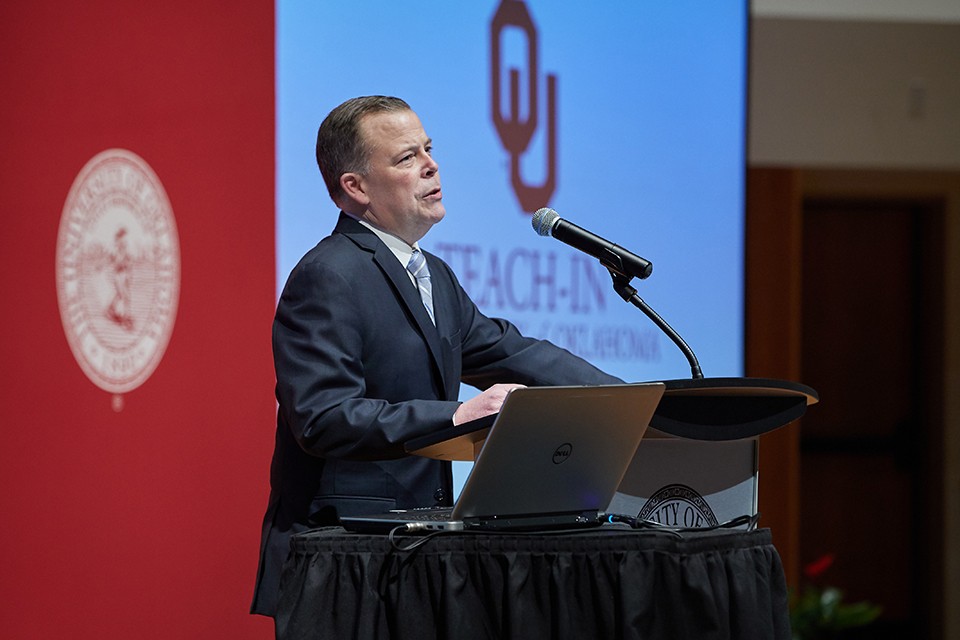 Justin Wert presenting at a teach-in.