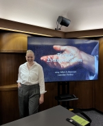 Photo of Caroline Perkins presenting.