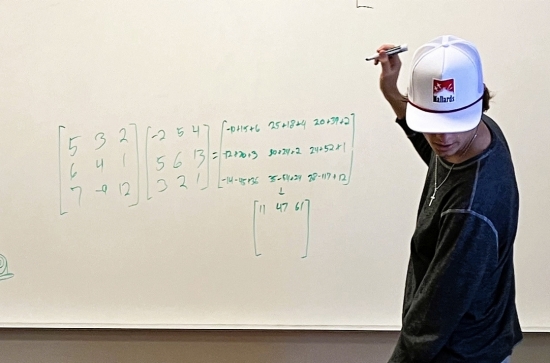 Student working a math problem