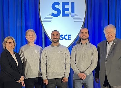 From left, SEI managing director Laura Champion, OU graduate students Richard Campos, Omar Yadak, Jacob Choate, and SEI president Don Scott. 