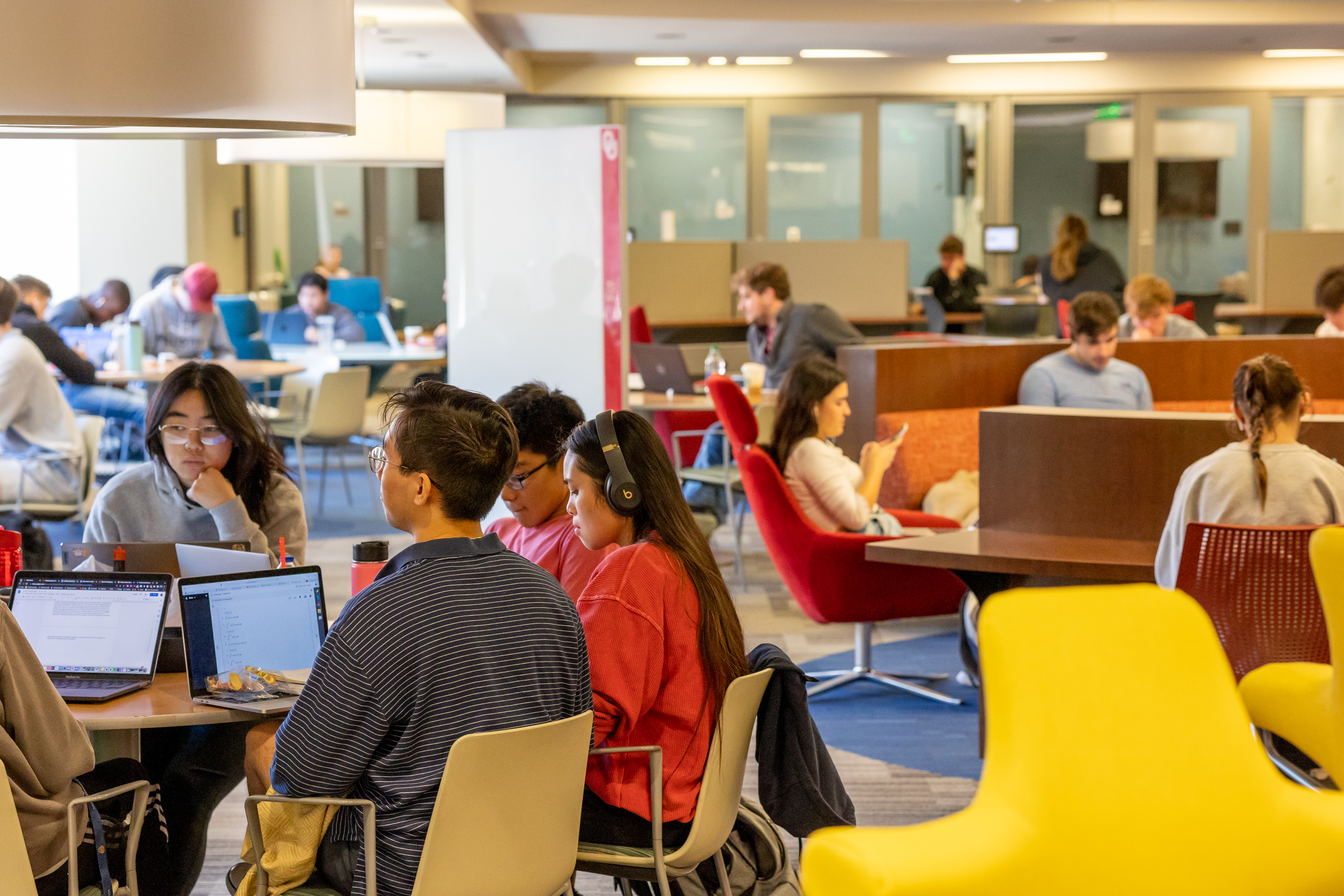 Students studying together in a library.