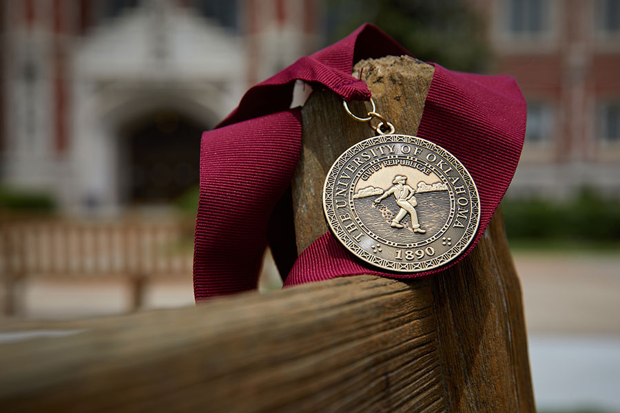 An O U award medallion.