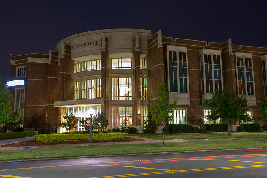 Gaylord College at night.