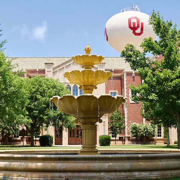 Decorative fountain between two buildings on campus. 
