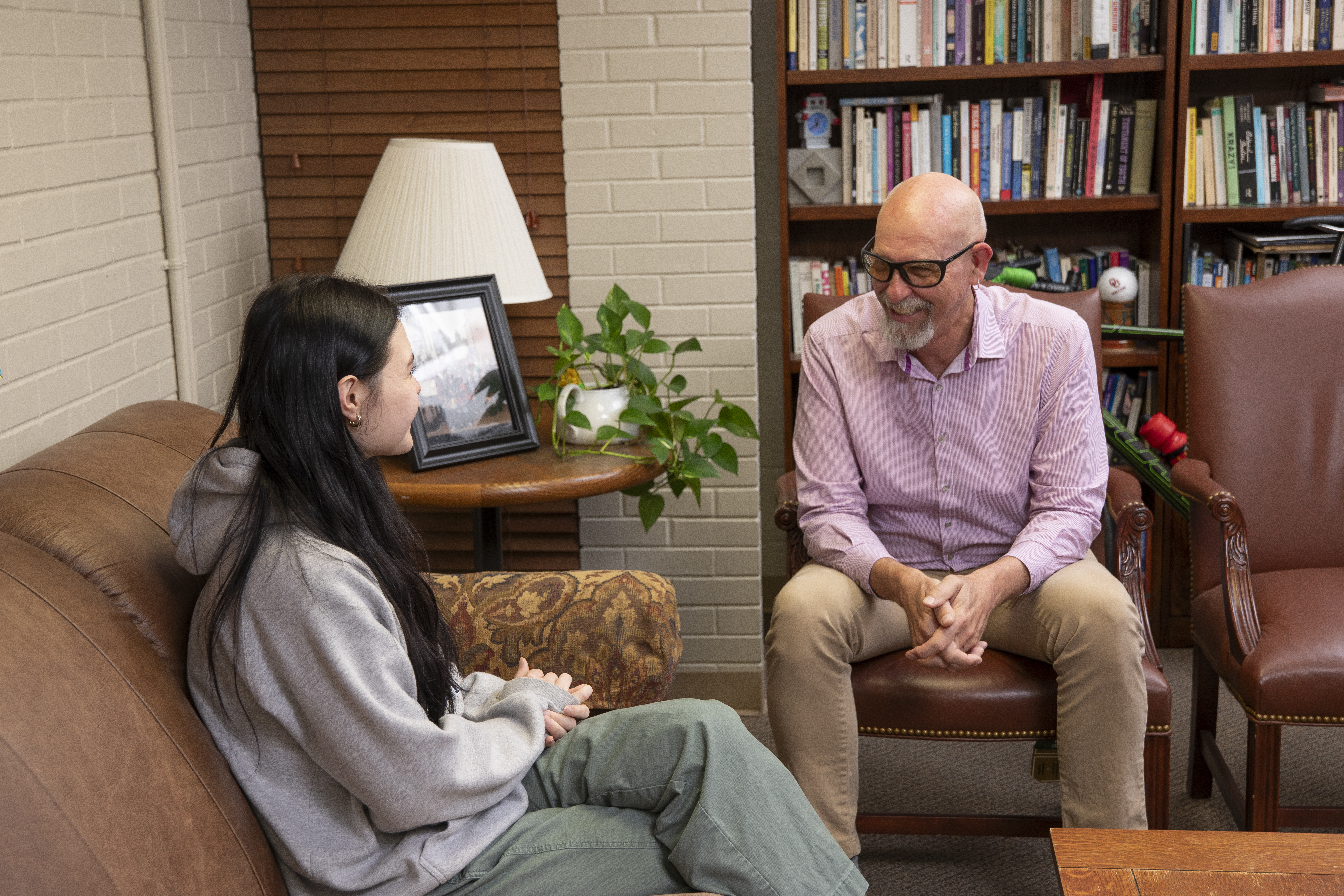 A student with an advisor.
