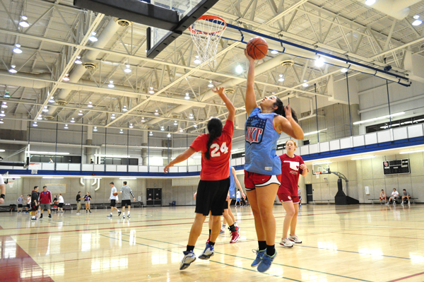 Students playing basketball