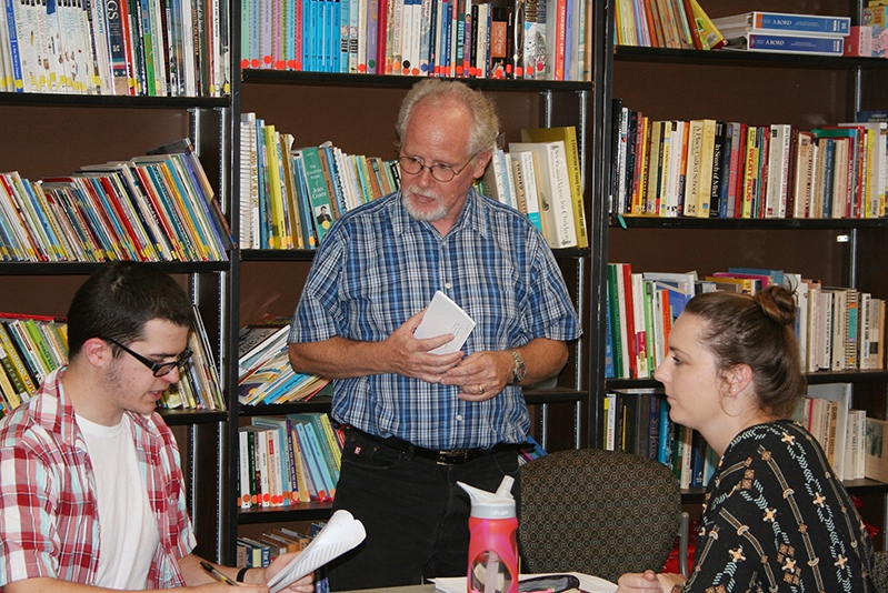 Crag Hill talking to students in class
