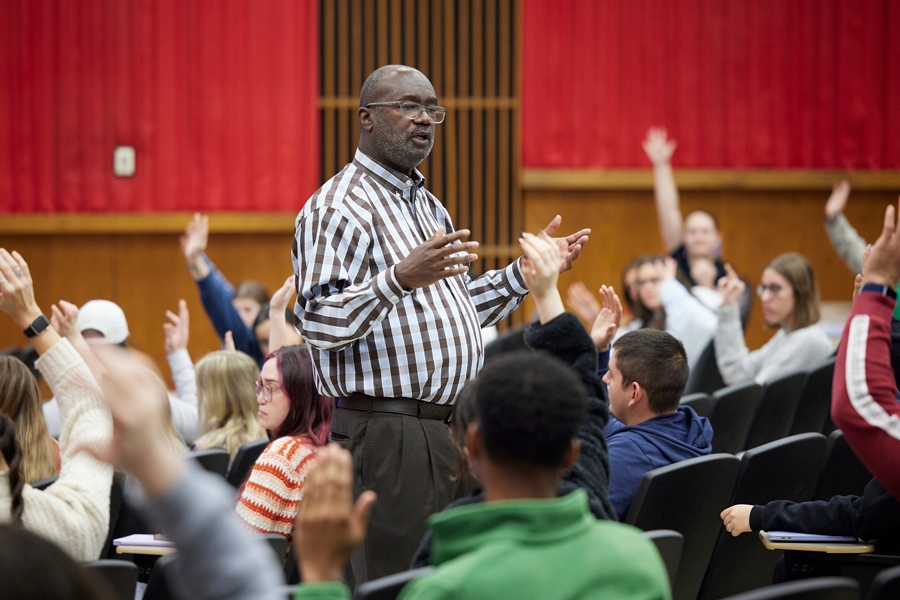 University of Oklahoma faculty member lecturing inside a classroom.