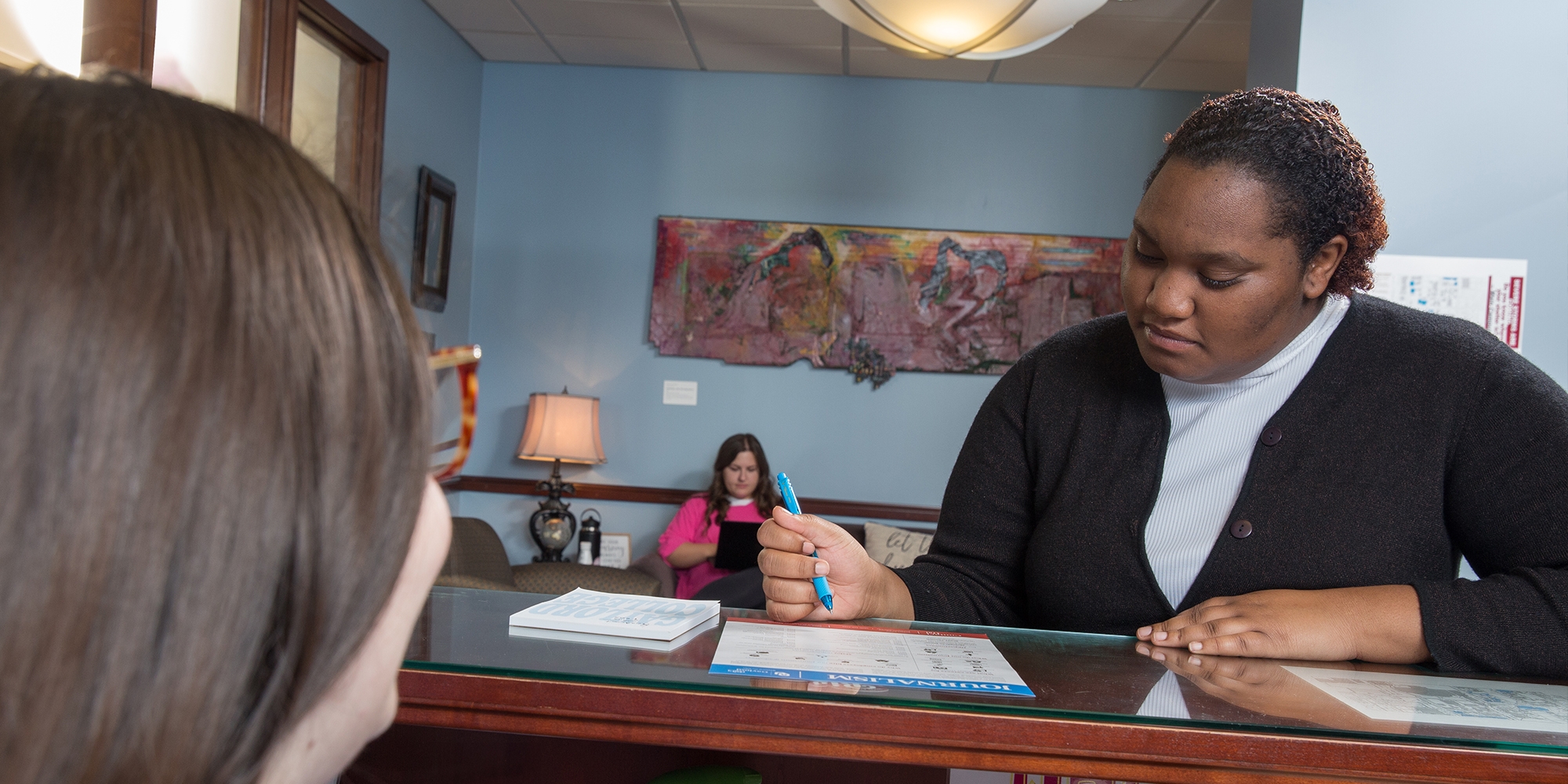 Student in student services office