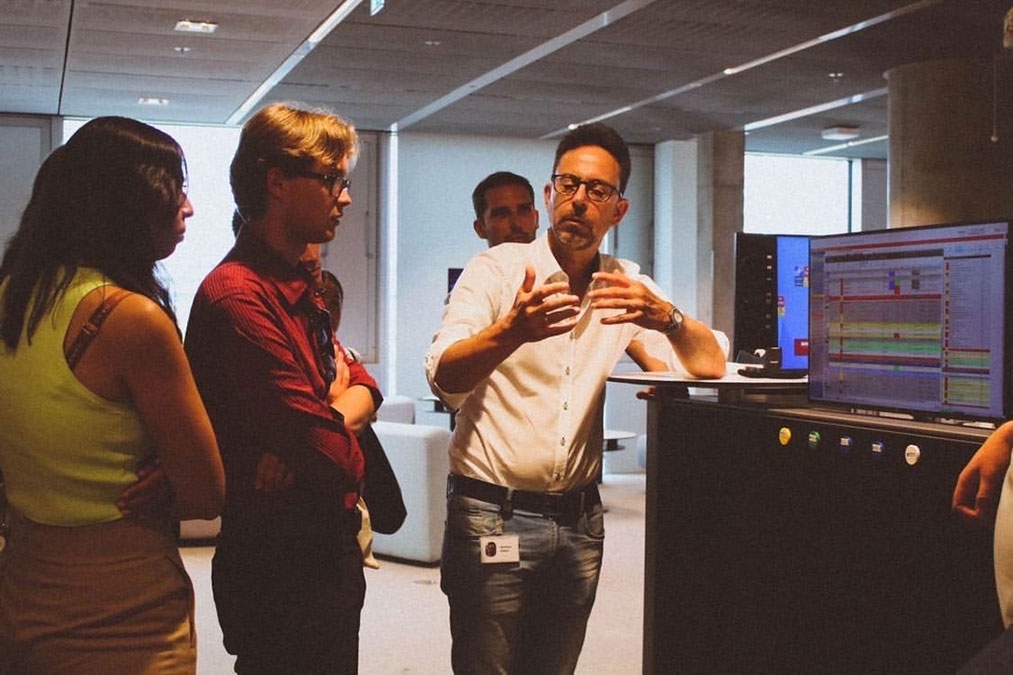 Noah Mack Standing in a newsroom during his study abroad trip to Berlin. 