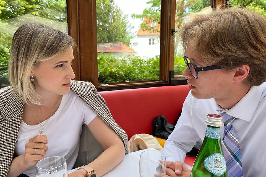 Noah Mack with Nadin at a cafe during the RIAS study abroad trip. 