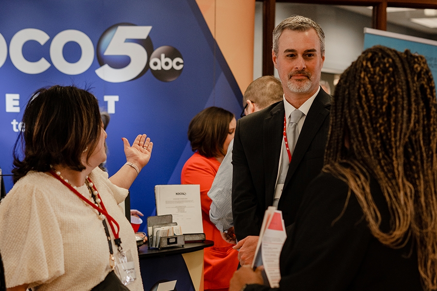 People talking during Gaylord College Career Fair