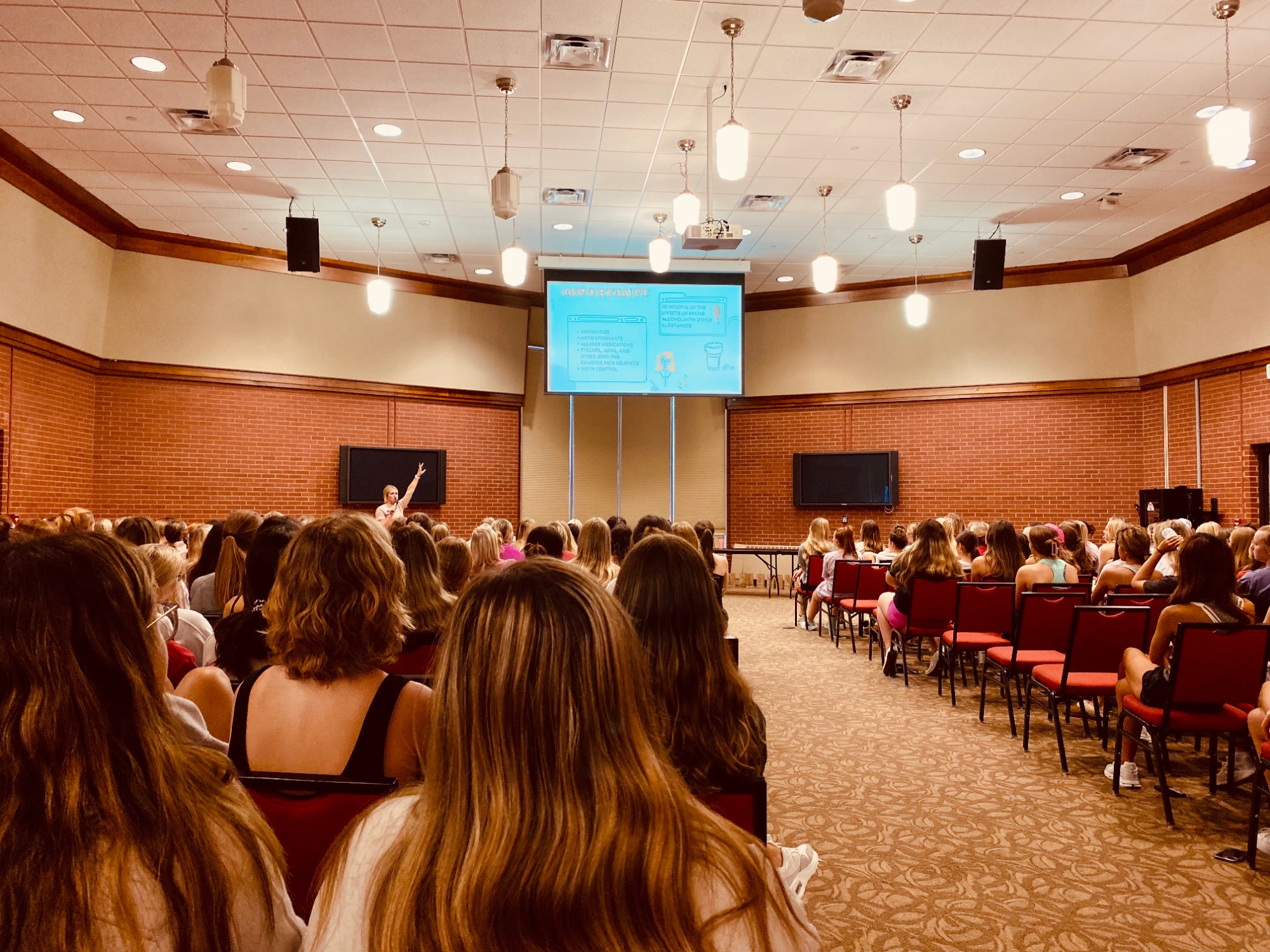 large audience at health promotion presentation