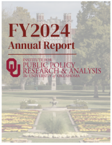 Cover image of IPPRA's 2024 Annual Report showing a lightened image of the Bizzel Library across the South Oval with title writing overlayed on the image.