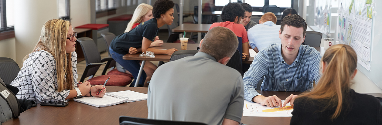 Students collaborating on a project in the Irani Center for Energy Solutions.