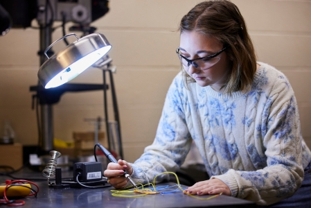 A student doing a lab experiment.