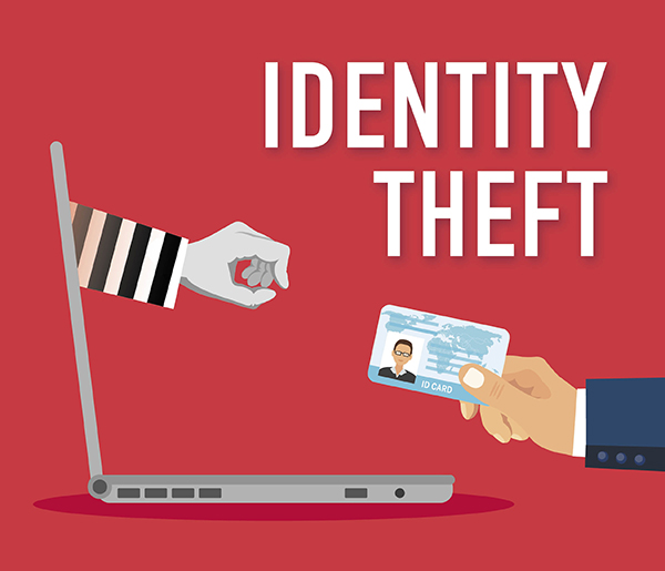 hand stealing id card from computer photo