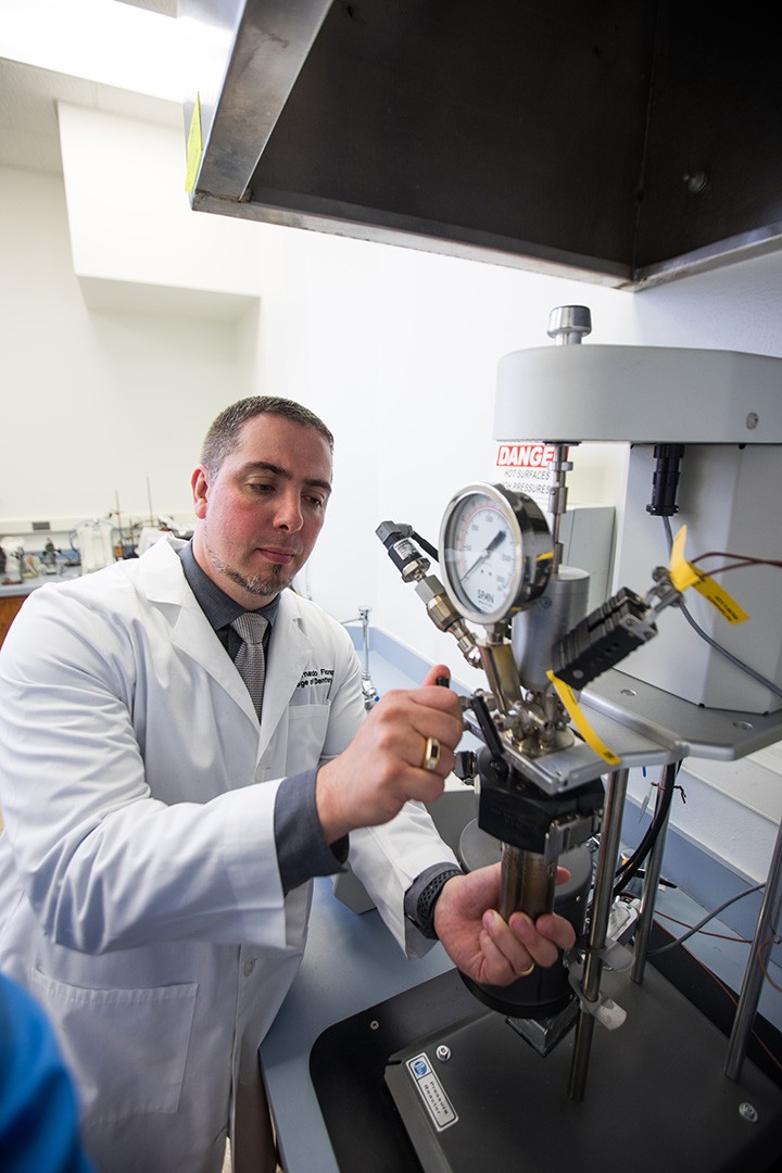 Doctor working on lab equipment