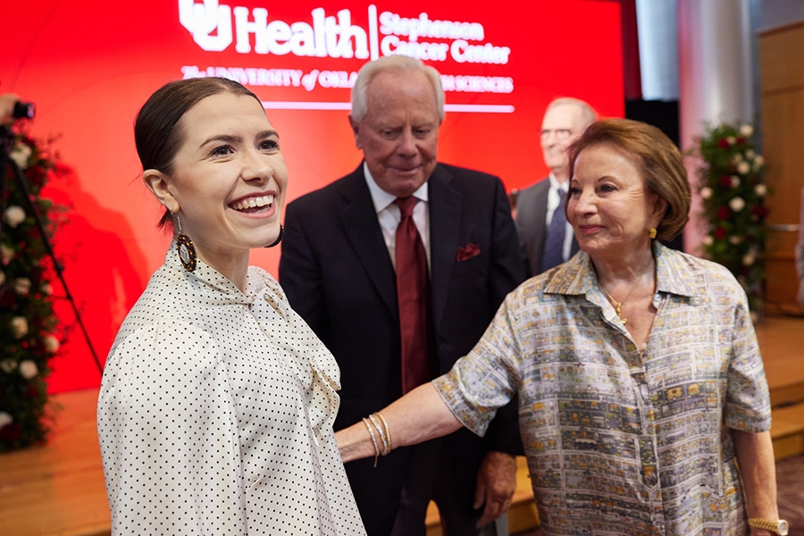 Small group of people smiling.