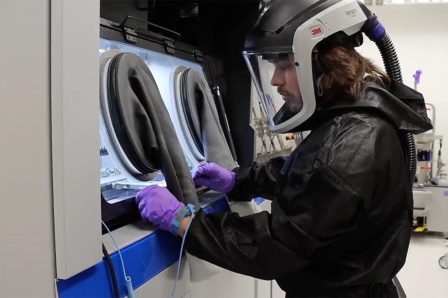 OU student using an advanced manufacturing device.