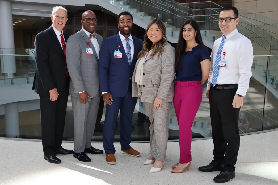 OU Hudson College of Public Health Dean Dale Bratzler, D.O., MPH (left); Jimmy Duncan, OU Health chief human resources officer (second from left); and Gani Davlyatov, Ph.D., College of Public Health MHA program director (right) are pictured with the inaugural recipients of the OU Health Administrative Fellowship, Shawn Long, Bethanie Lor and Safra Shakir.