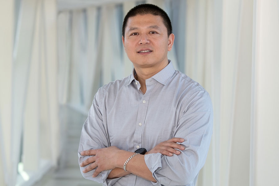 Tiangang Li.