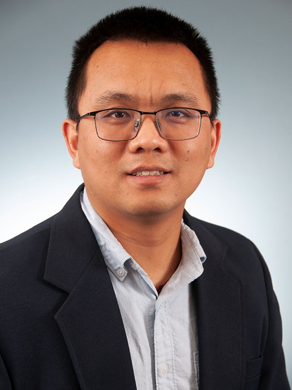 Chenggang Wang. 