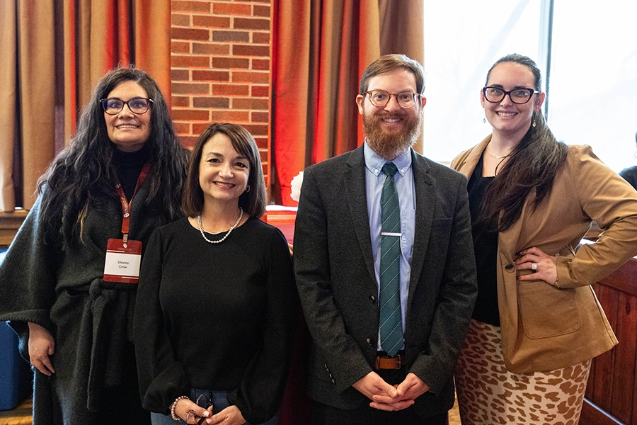 M.L.S. students Sheree Crow and Melissa Powell with Joseph Schremmer and Kayla Doiron, director of OU Law graduate programs.