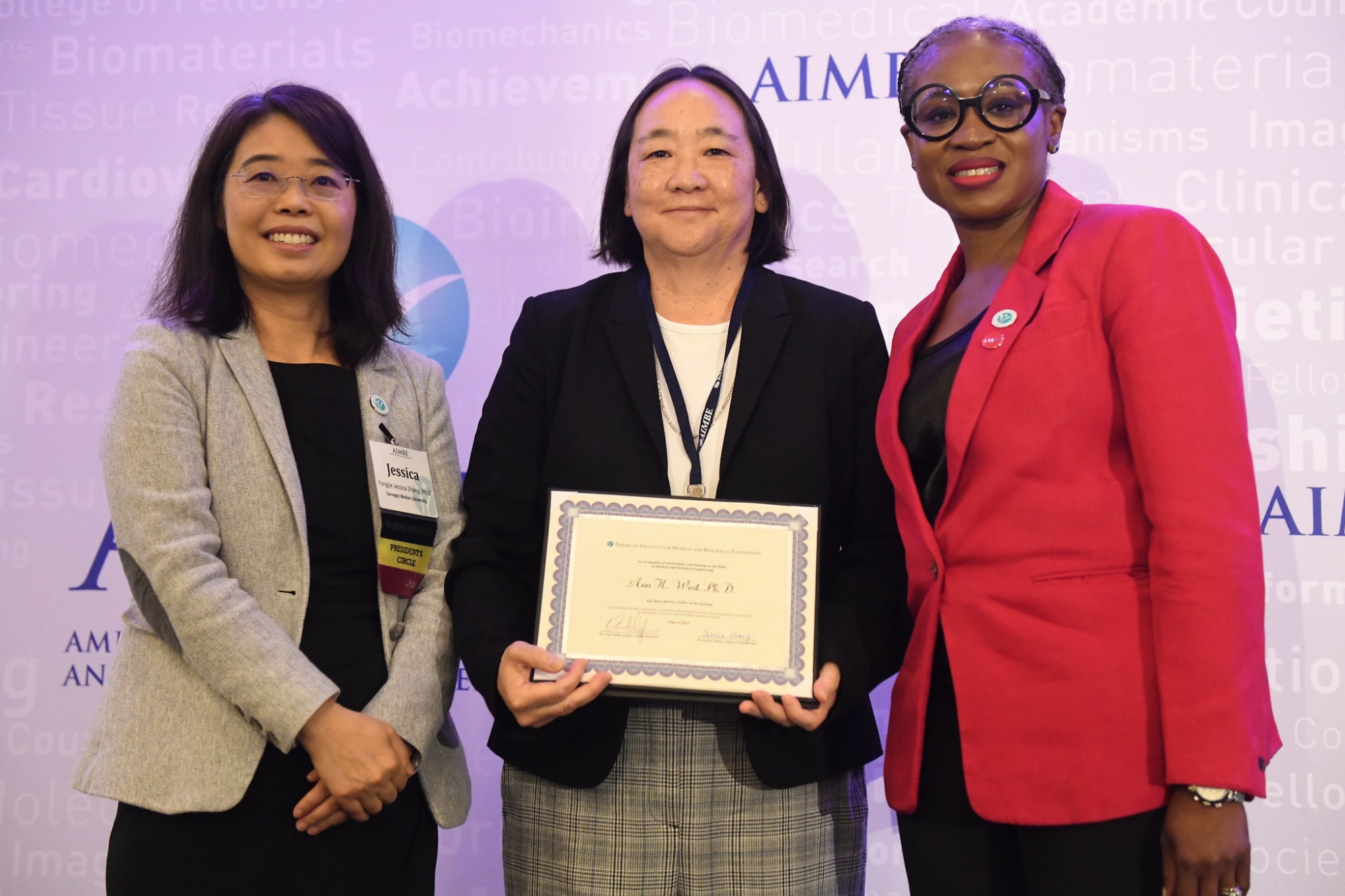 Ann West accepts her AIMBE award.