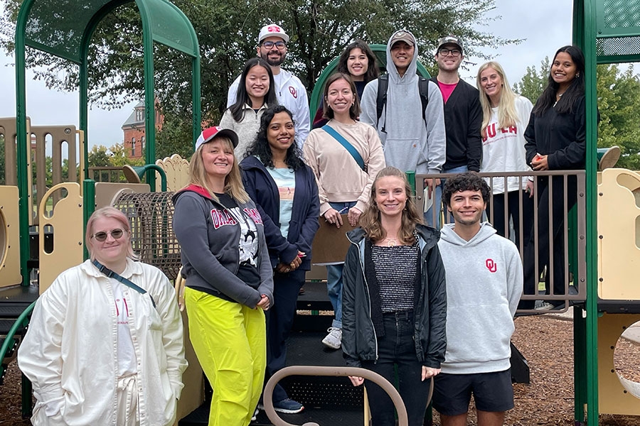 People standing on a playground.