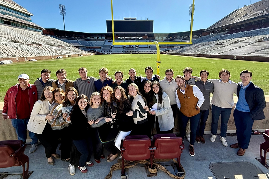 Students from Baylor's BEST program visit Oklahoma Memorial Stadium with students from Price's entrepreneurship program.