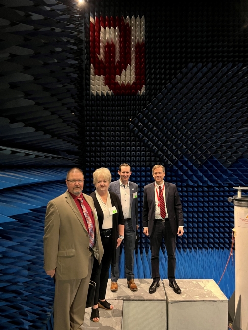 Boeing Execs stand with representatives from OADII, and OU 