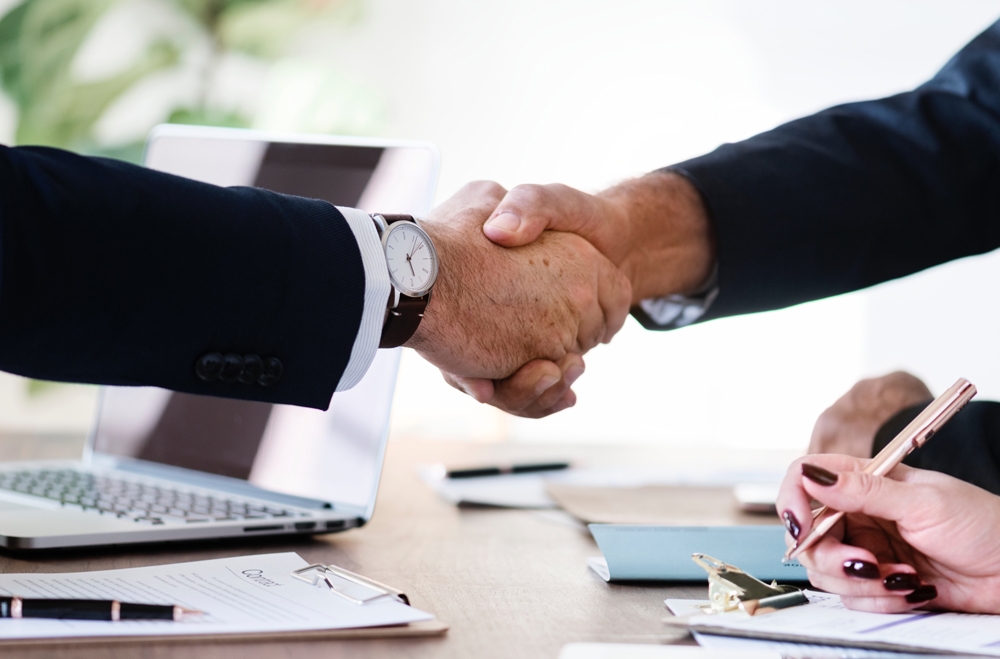 people shaking hands