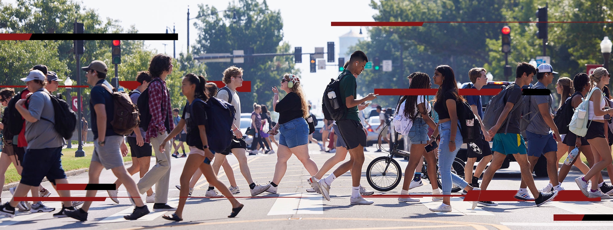 Busy college students crossing the street. 