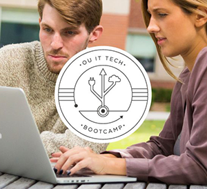 Image of students working on a computer with the Tech Bootcamp logo.