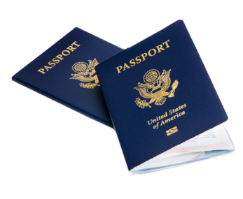 Two passport books, with one book laying on top of the other.