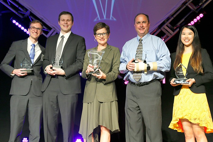 Bebel Analytics team poses with award