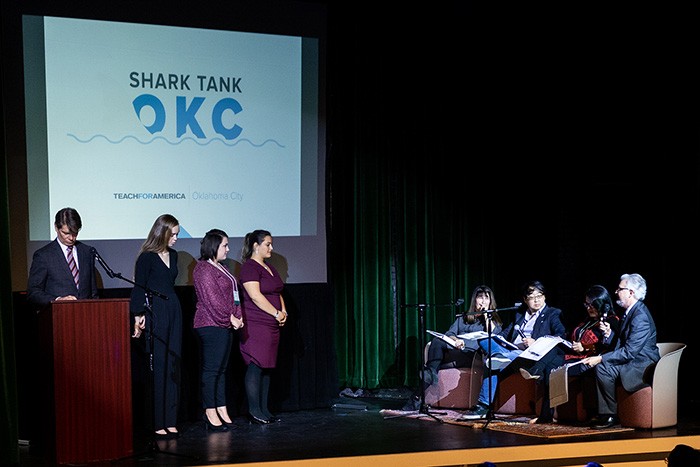 Tom Lumpkin on stage during Teach for America event 
