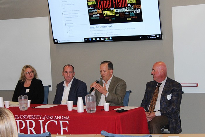 (left to right) Price faculty Alexandra Durcikova; Nate Graham, Devon Energy Industry; Chris Fallow and Dylan Burns, American Fidelity Assurance. 