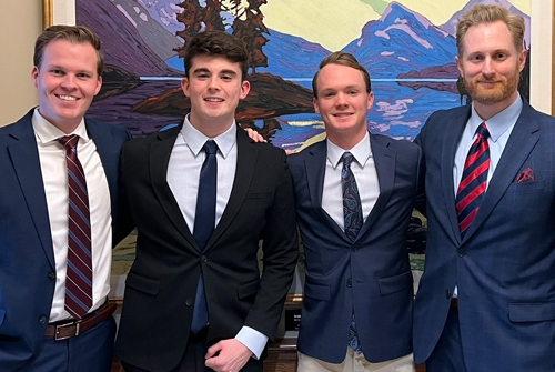 CFA Tem Alex Holt, Rhett Manley and James Beers pose with coach Jason Turkiela 