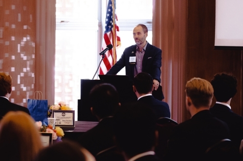 Brad Scroggin stands at the podium to address the audience at the Parker Leadership Conference